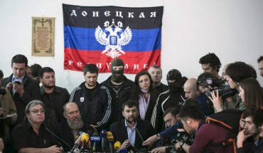 The head of pro-Russian separatists government Denis Pushilin speaks during news conference in regional government building in Donetsk